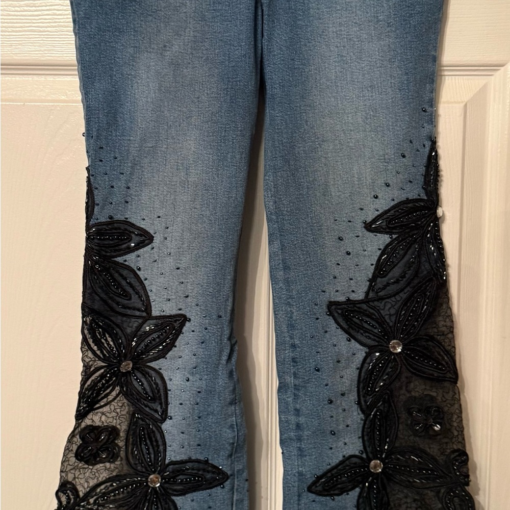 Elegant Blue Jeans with Black Floral Embroidery
